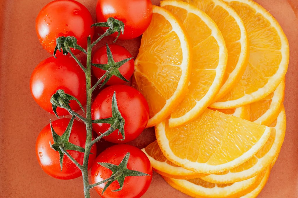 Tomates y naranjas ricas en vitamina C